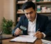 Businessman reviewing PCD pharma franchise agreement to avoid common mistakes